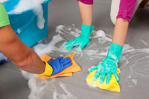 Person cleaning a room before moving out
