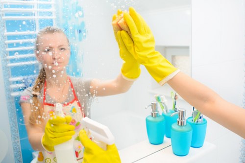 Professional cleaning crew following safety standards at a vacant property