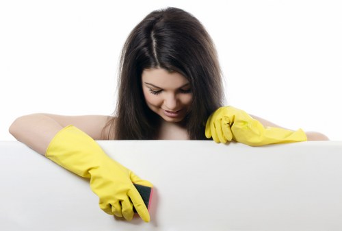 Cleaner using a step stool safely during vacate cleaning